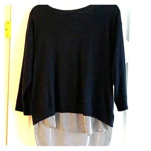 Navy sweater with blouse underneath